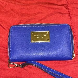 Small blue MK wristlet.